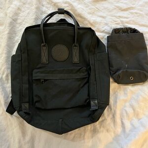 Fjallraven Kanken No. 2 All Black w/ shoulder pads, chest strap & bottle pocket.